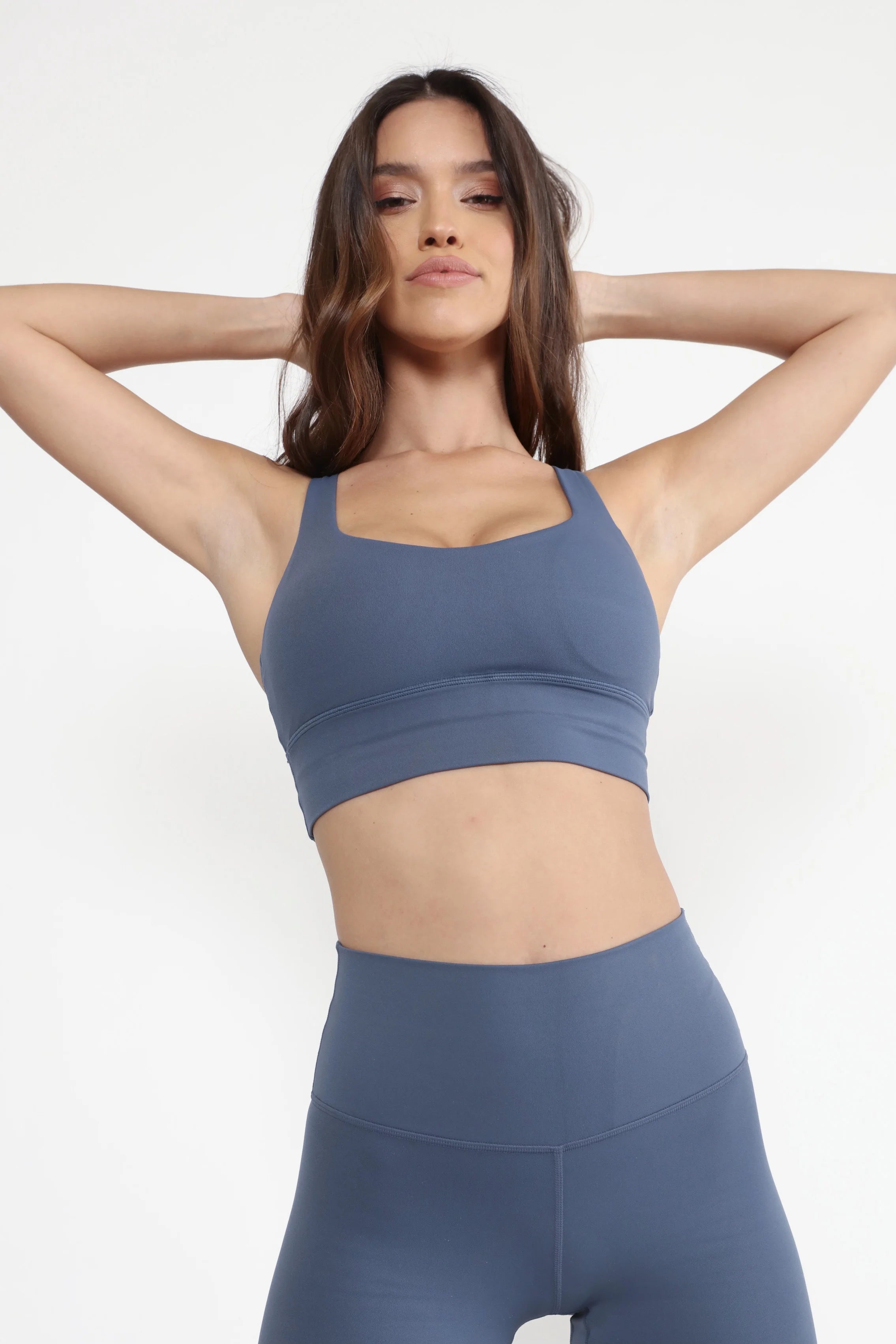 Woman wearing comfortable activewear sports top for exercising