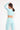 Rainbow long sleeve bra mint green back view in model - JUV