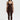 Sleek long jumpsuit brown in model front view - JUV