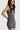 Sleek short jumpsuit gray in model side view close up - JUV